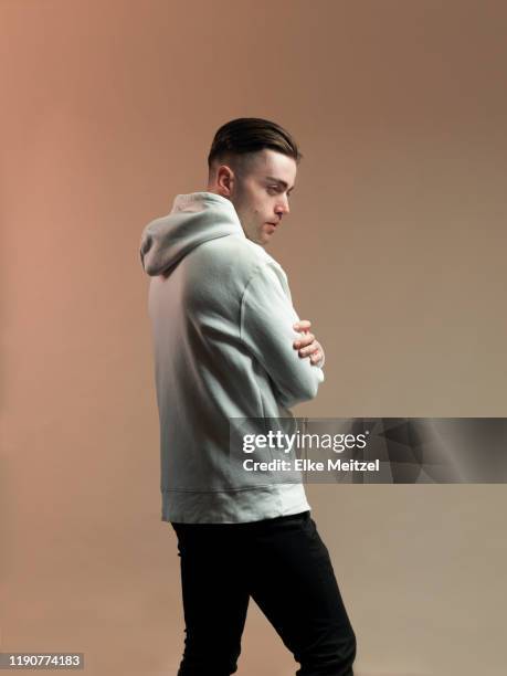 young man turning away - modern manlighet bildbanksfoton och bilder