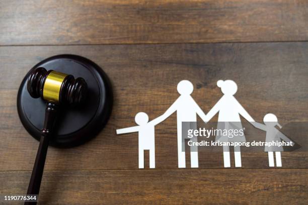 family law concept. wooden figures and gavel,family law,insurance concept - family law stockfoto's en -beelden