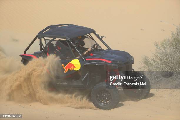 Max Verstappen of Netherlands and Red Bull Racing and Alexander Albon of Thailand and Red Bull Racing take part in the Red Bull Desert Racing at...