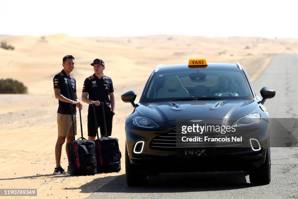 Max Verstappen of Netherlands and Red Bull Racing and Alexander Albon of Thailand and Red Bull Racing take part in the Red Bull Desert Racing at...