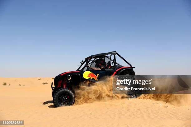 Max Verstappen of Netherlands and Red Bull Racing and Alexander Albon of Thailand and Red Bull Racing take part in the Red Bull Desert Racing at...