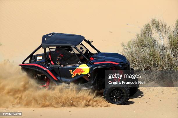 Max Verstappen of Netherlands and Red Bull Racing and Alexander Albon of Thailand and Red Bull Racing take part in the Red Bull Desert Racing at...