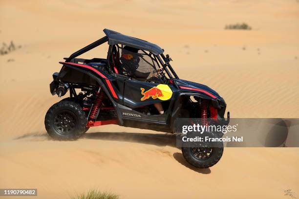 Max Verstappen of Netherlands and Red Bull Racing and Alexander Albon of Thailand and Red Bull Racing take part in the Red Bull Desert Racing at...