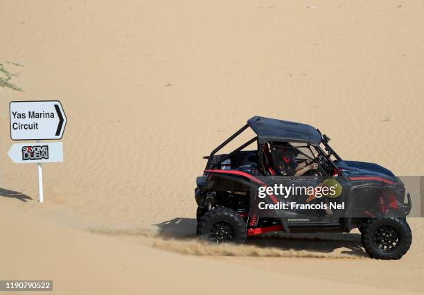 Max Verstappen of Netherlands and Red Bull Racing and Alexander Albon of Thailand and Red Bull Racing take part in the Red Bull Desert Racing at...