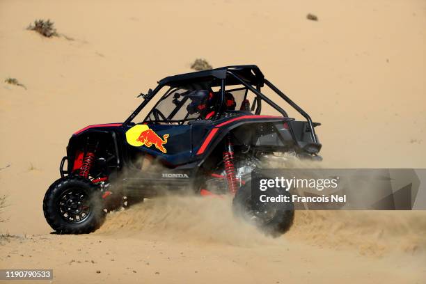 Max Verstappen of Netherlands and Red Bull Racing and Alexander Albon of Thailand and Red Bull Racing take part in the Red Bull Desert Racing at...