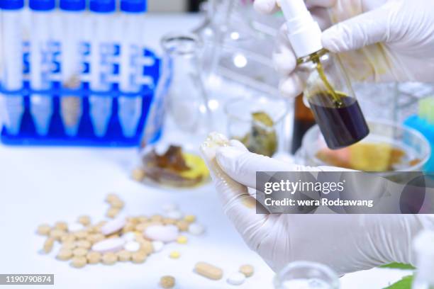 clinical research using cannabis as part of drug development process - cannabis concentrate stock pictures, royalty-free photos & images