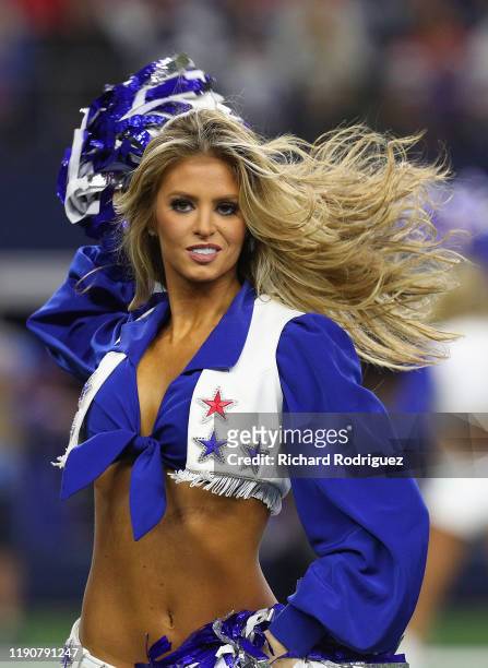 Dallas Cowboys Cheerleader perform during a game against the Buffalo Bills at AT&T Stadium on November 28, 2019 in Arlington, Texas.