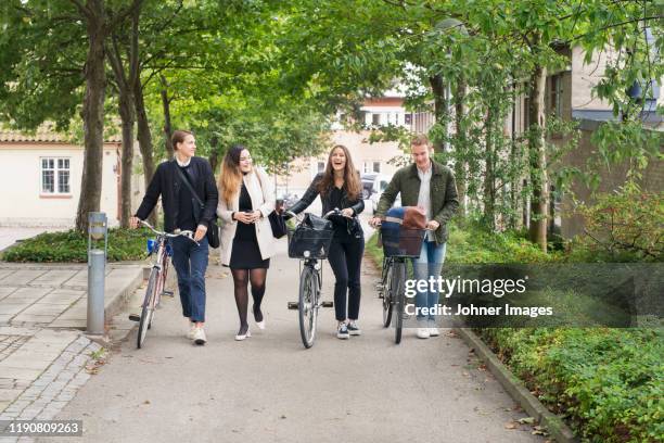 friends walking - lund sweden stock pictures, royalty-free photos & images