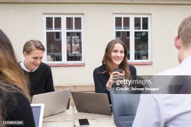 business people using laptops - lund sweden stock pictures, royalty-free photos & images