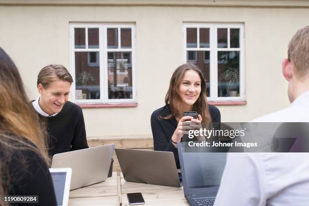 business people using laptops - lund - fotografias e filmes do acervo