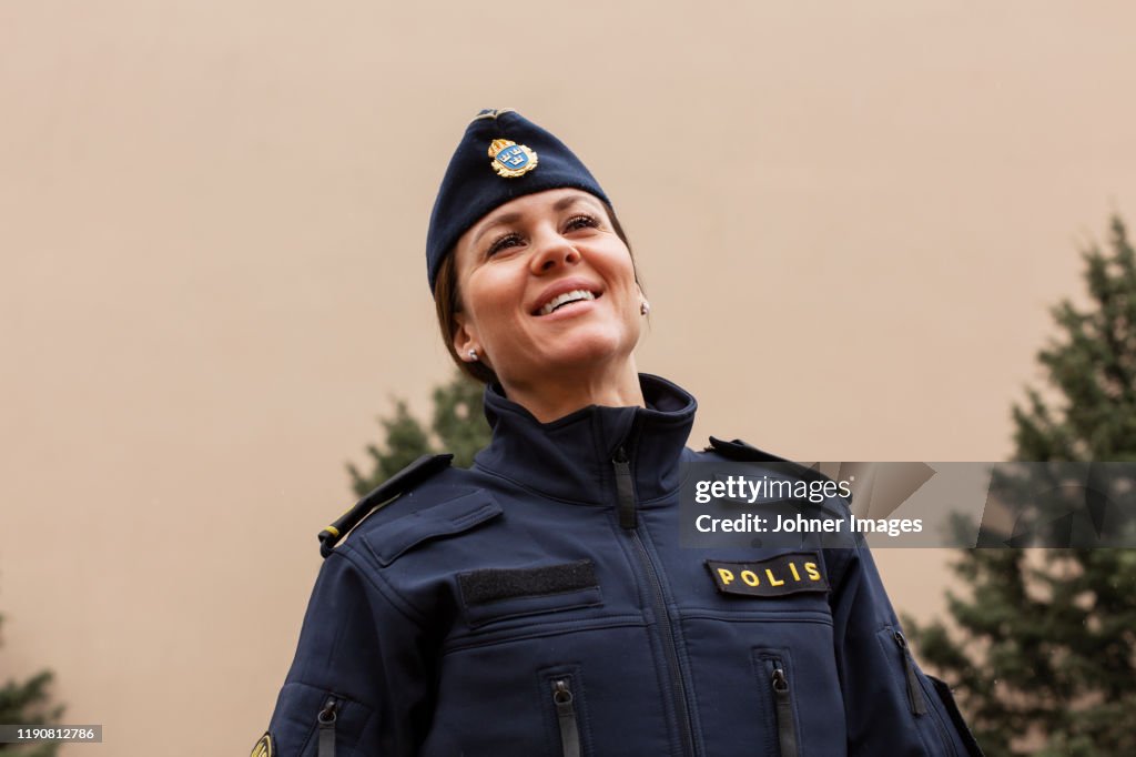 Police woman looking away