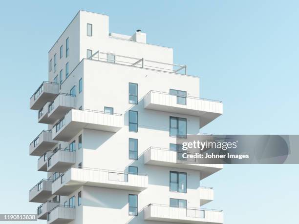 view of modern block of flats - modern apartment building exterior stock pictures, royalty-free photos & images