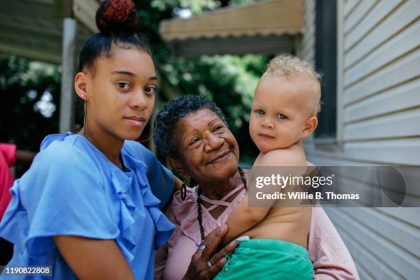 black grandmother with grandchildren - middle class female stock pictures, royalty-free photos & images