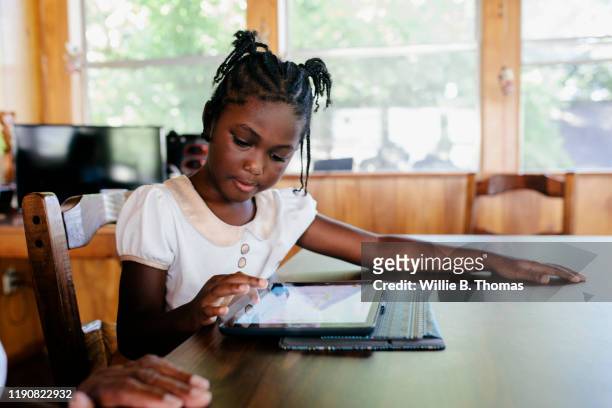 Young black child doing homework
