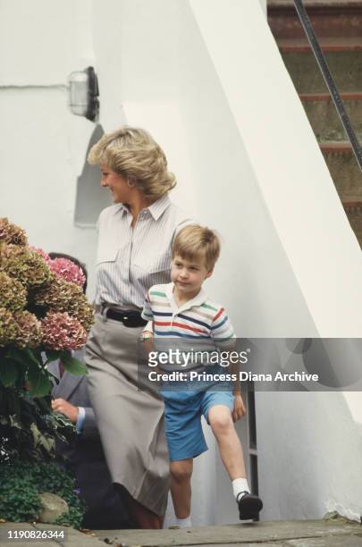 Diana, Princess of Wales with her son Prince William on his brother Prince Harry's first day at Mrs Mynors' nursery school in London, September 1987.
