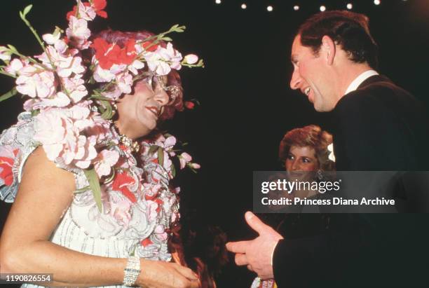 Prince Charles and Diana, Princess of Wales attend a royal charity gala performance of 'Back With A Vengeance', and meet the star Barry Humphries ,...