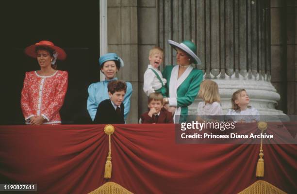 The royal family on the balcony of Buckingham Palace in London during the Trooping the Colour ceremony, June 1988. From left to right, Queen Noor of...