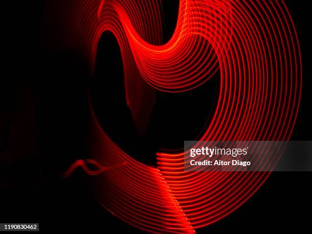 heart shape designed with futuristic red lines.  social networks - image manipulation 個照片及圖片檔