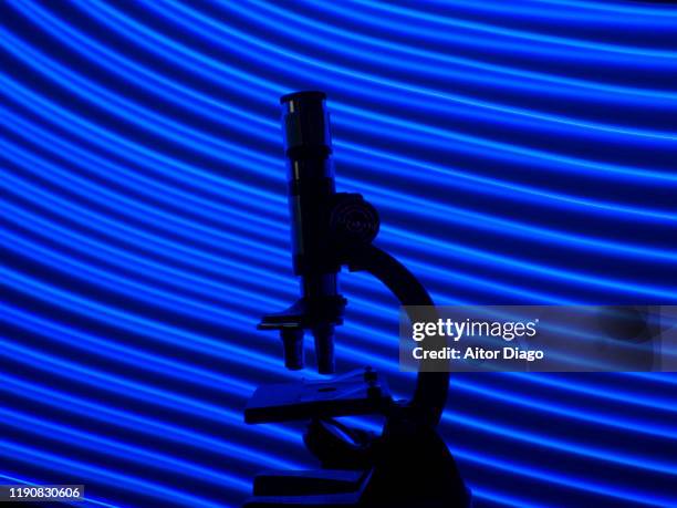Macroscope Vector 1,970 Atom Under Microscope Stock Photos and High-Res Images - Getty Images