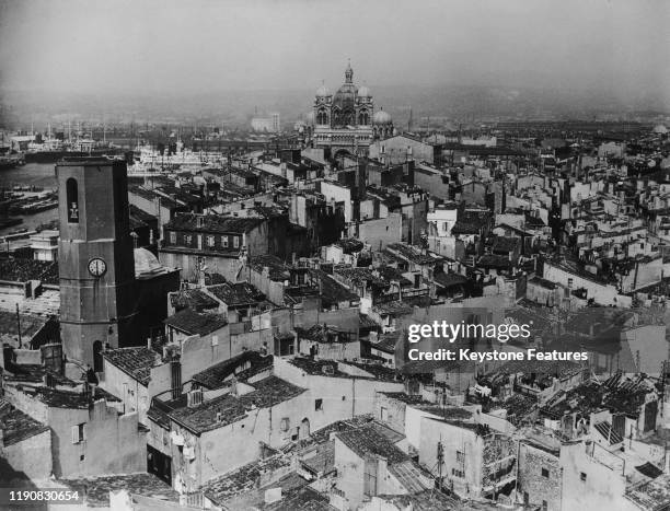 The city of Marseille, France, with the Roman Catholic cathedral in the background centre, circa 1930.