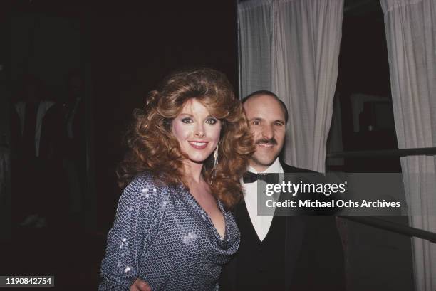 American actress and singer Rebecca Holden with her partner Bobby Vassallo, circa 1985.