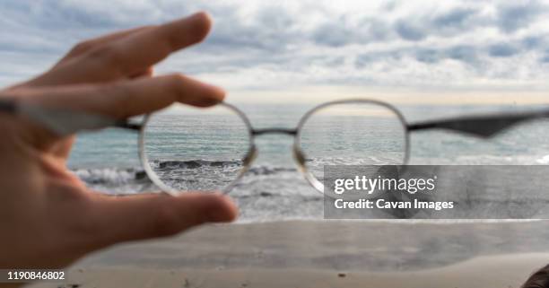 sea seen through vision glasses - water glasses ストックフォトと画像
