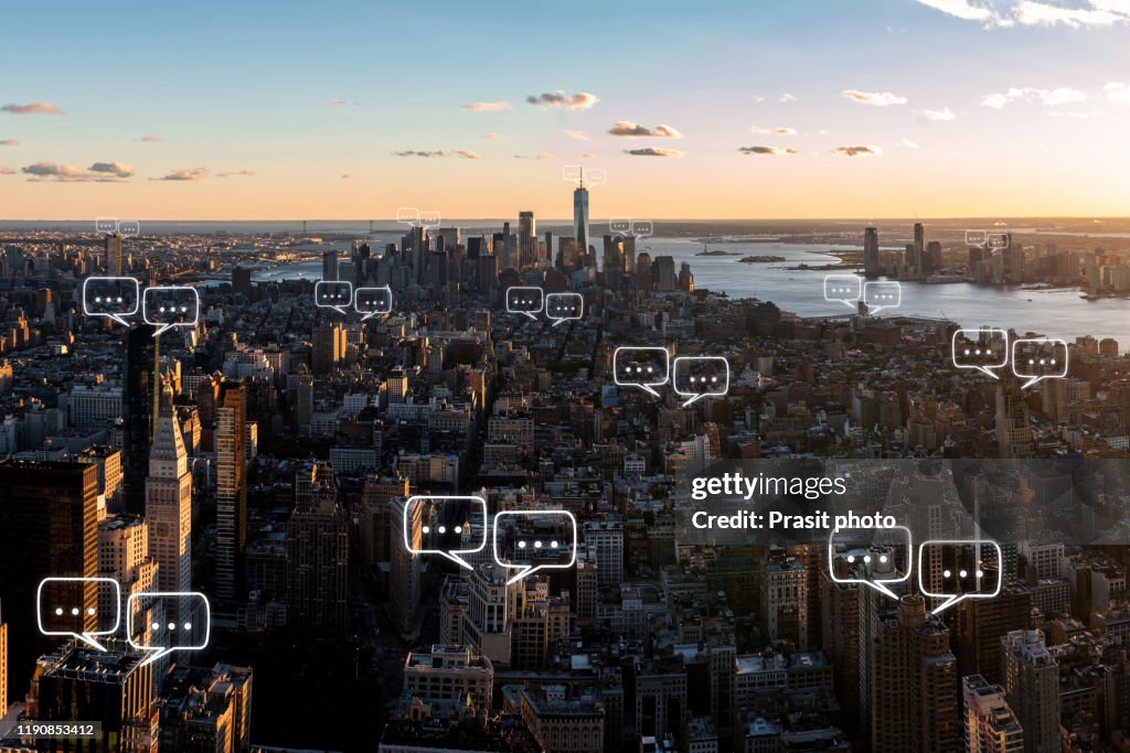 Bubble chat for communication for text on Manhattan skyline in New York City and sky background with bubble chat ,business analysis and strategy as concept