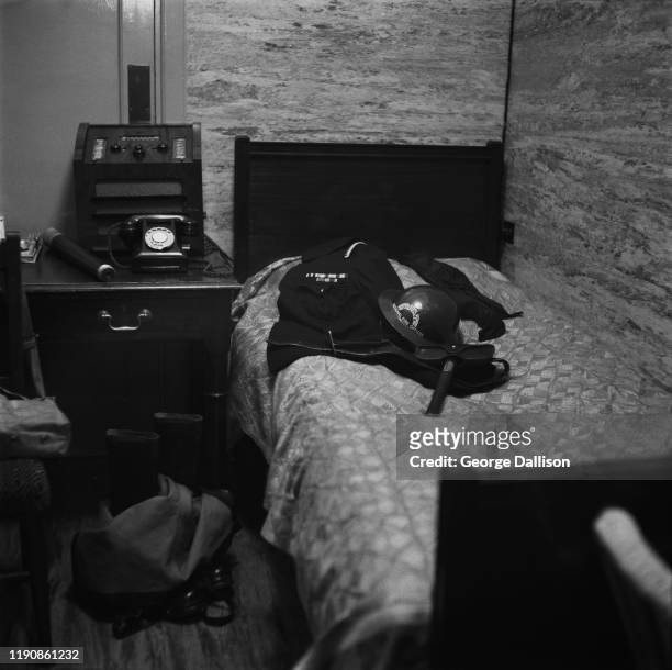 The uniform of a Civil Defence Regional Fire Officer on a bed at the Auxiliary Fire Service control room in London during World War II, UK, October...