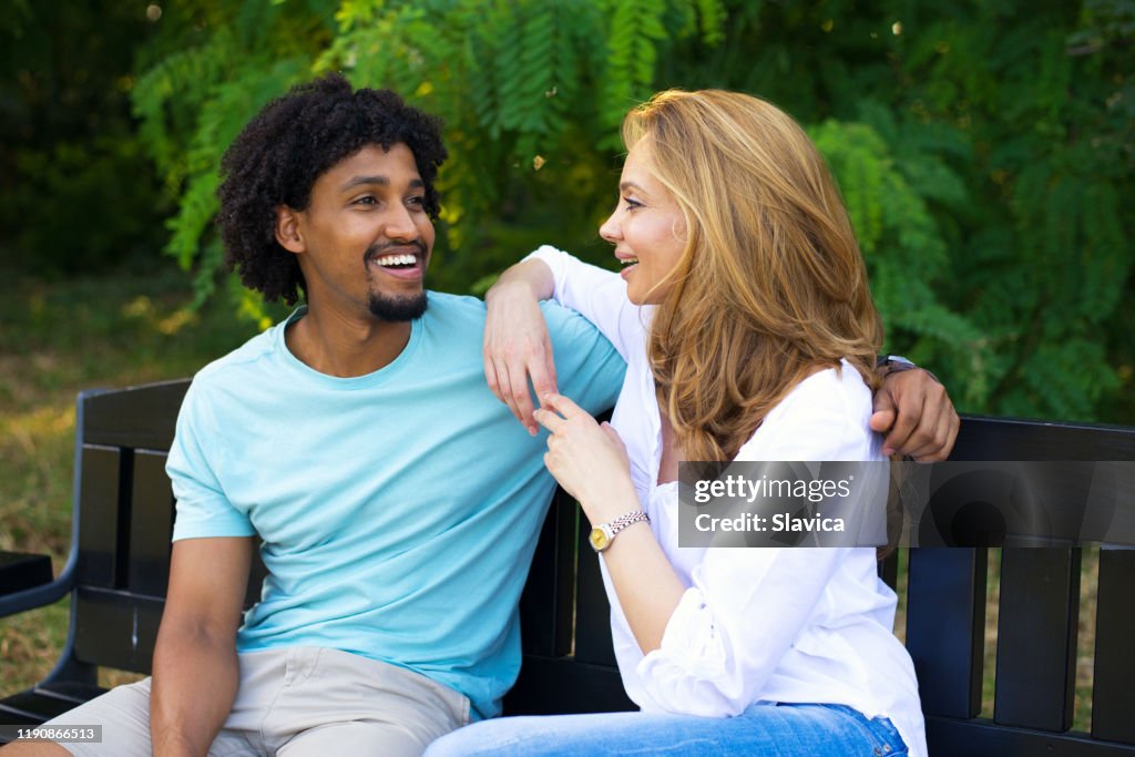 Young couple talking in the nature