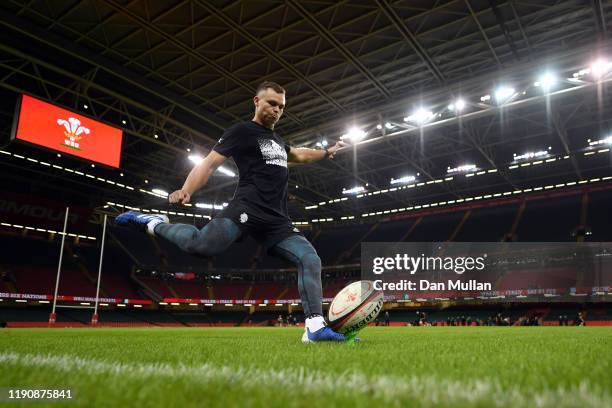 Curwin Bosch of the Barbarians takes a kick at goal during the Barbarians Captain's Run at Principality Stadium on November 29, 2019 in Cardiff,...