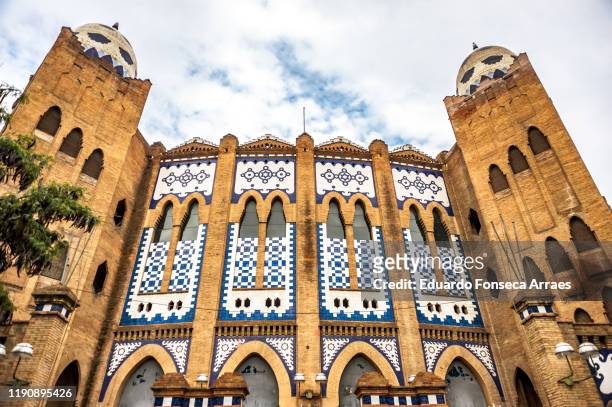 façade of the plaza monumental de barcelona - plaza de toros barcelona stock pictures, royalty-free photos & images