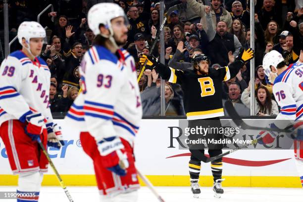David Pastrnak of the Boston Bruins celebrates after scoring a goal against the New York Rangers during the third period at TD Garden on November 29,...