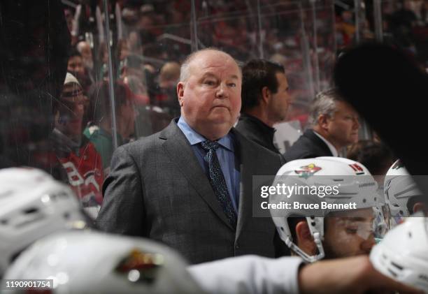 Head coach Bruce Boudreau of the Minnesota Wild handles bench duties against the New Jersey Devils at the Prudential Center on November 26, 2019 in...