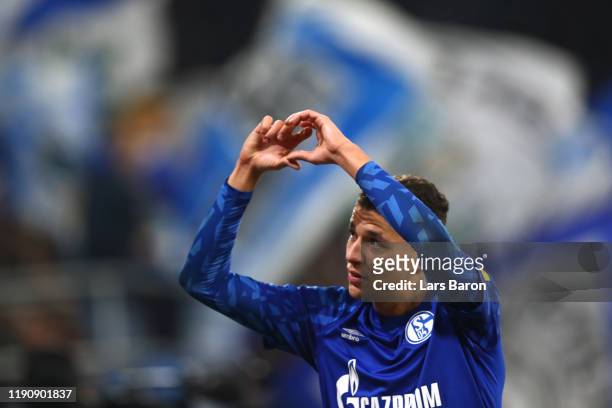 Amine Harit of FC Schalke 04 salutes the fans as he is substituted during the Bundesliga match between FC Schalke 04 and 1. FC Union Berlin at...