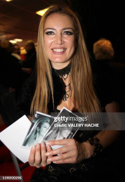 Patrizia d'Addario, the call girl who claims she spent a night with Italian Prime Minister Silvio Berlusconi, presents her disc with title "All you...