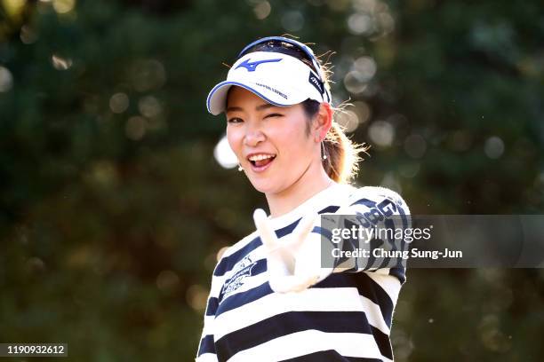 Erika Hara of Japan poses after hitting her tee shot on the 2nd hole during the third round of the LPGA Tour Championship Ricoh Cup at Miyazaki...