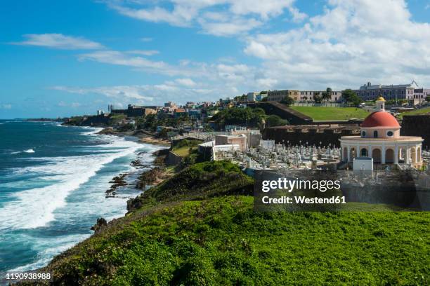 view of santa mara magdalena de pazzis cemetery by sea against sky, puerto rico, caribbean - velha san juan imagens e fotografias de stock