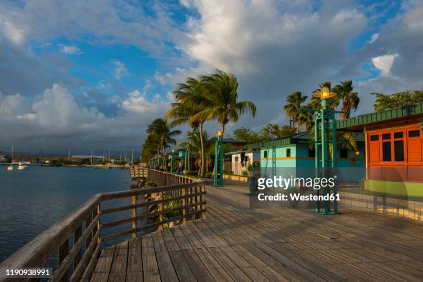 houses on pier at ponce harbor, puerto rico, caribbean - ponce puerto rico stock pictures, royalty-free photos & images
