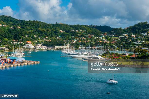 high angle view of st georges, capital of grenada, caribbean - st george's harbour stock pictures, royalty-free photos & images