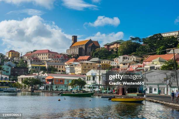 harbor of st georges against sky, capital of grenada, caribbean - st george's harbour stock pictures, royalty-free photos & images