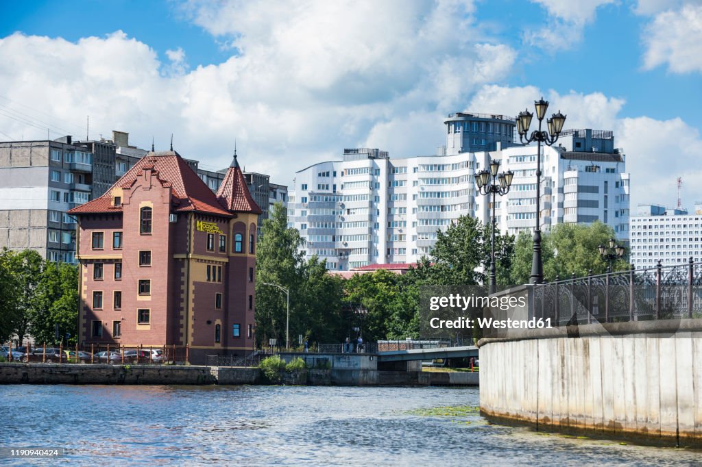 Fishing Village by Pregel river against sky, Kaliningrad, Russia