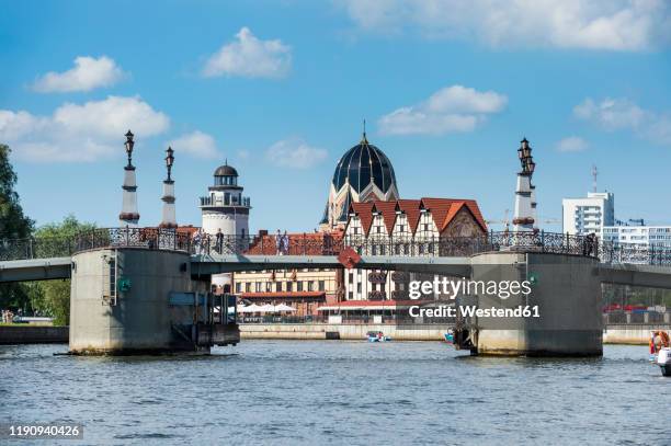 bridge over pregel river against sky at kaliningrad, russia - kaliningrad stock pictures, royalty-free photos & images
