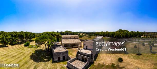 aerial view of santa maria a cerrate against clear blue sky during sunny day, lecce, italy - cerrate fotografías e imágenes de stock