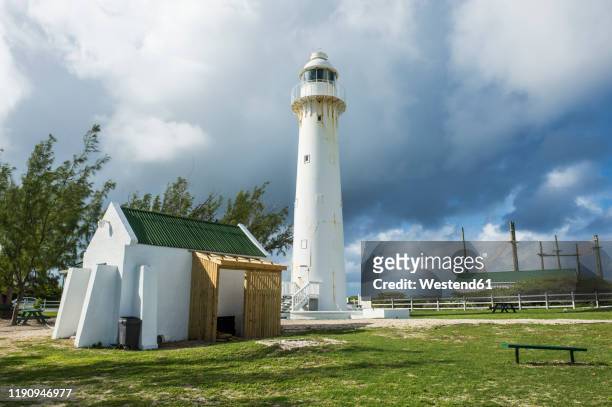 view of lighthouse against cloudy sky in grand turk, turks and caicos - socorro island imagens e fotografias de stock