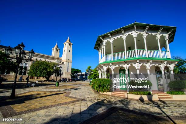 view of st. philip the apostle cathedral against clear blue sky during sunny day, puerto plata, dominican republic - puerto plata imagens e fotografias de stock
