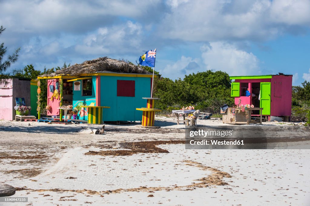 Shops at Five Cays beach against cloudy sky during sunny day, Providenciales, Turks And Caicos Islands
