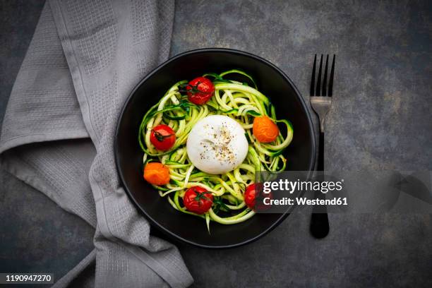 bowl of zoodles with baked tomatoes and burrata cheese - burrata stock pictures, royalty-free photos & images