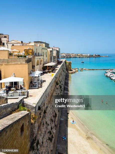 italy, province of lecce, otranto, coastal town in summer - otranto stock pictures, royalty-free photos & images