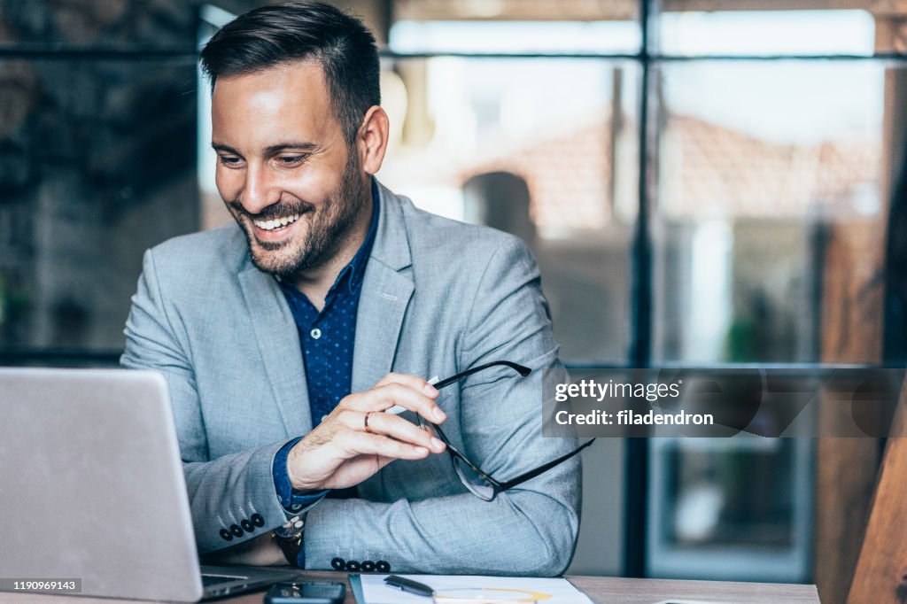 Young businessman working at office
