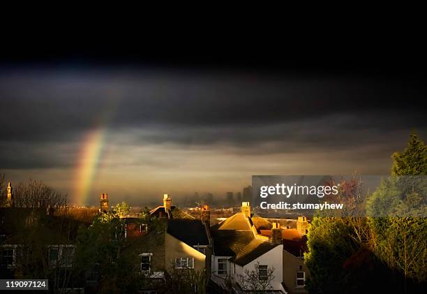 rainbow - storm clouds stock pictures, royalty-free photos & images